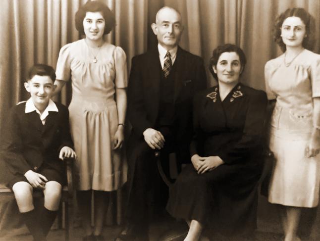 Procopiadis family photo. Left to right: John, sister Anastasia (Tess), father Nicholas, mother Elizabeth and sister Evelyn. Surry Hills, Sydney. 1946.