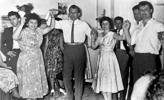 Wedding celebration. From left, unknown male in background, Asimo Karahaliou, Andreas Papakonstantinou (groom), Eleni Papakonstantinou (Bride) Costas Stavropoulos (Best man). Marrickville, 1/3/1959.
