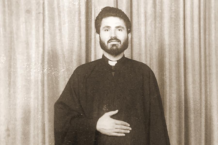 A person in priest robes
