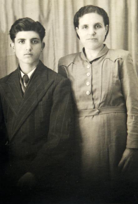 Two people pose for a photo