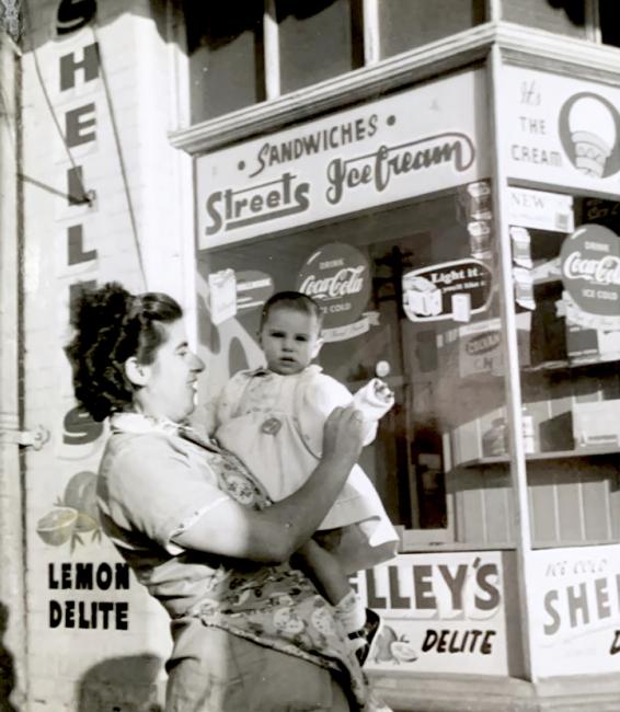 Evdokia Kokkinakos and daughter, Maria, outside of family business, Alexandria, Sydney, 1962