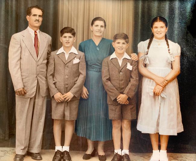 Vivi Koutsounadis (far right) with her father, Constantinos, brother, Steve, mother, Erini, and brother, John. Sydney, 1954