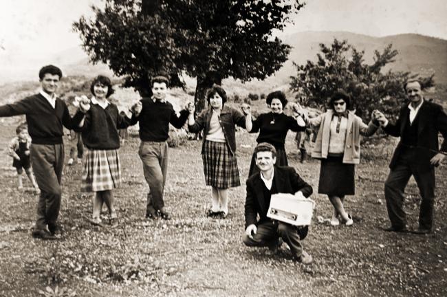 A group of people holding hands