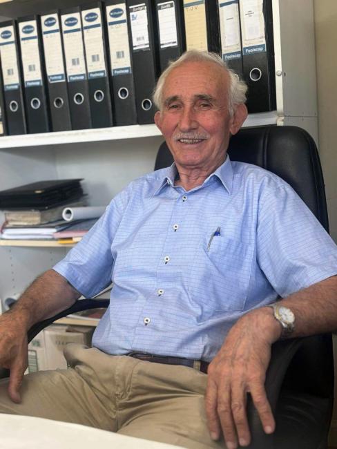 A man sitting in a chair